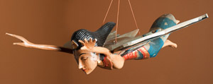 carving of flying woman